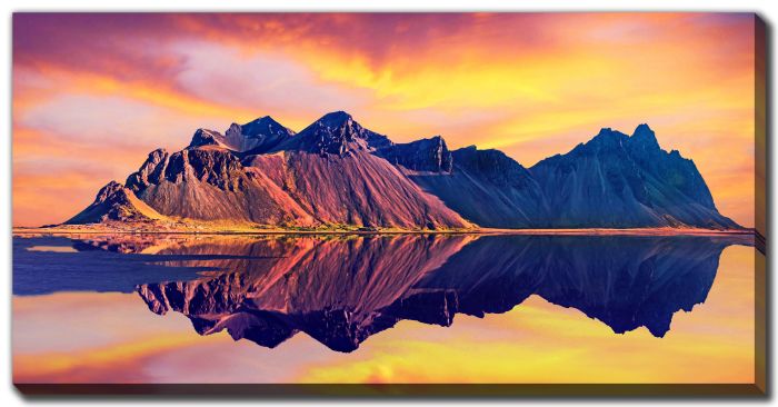 Reflections Of A Radiant Mountain Sunset